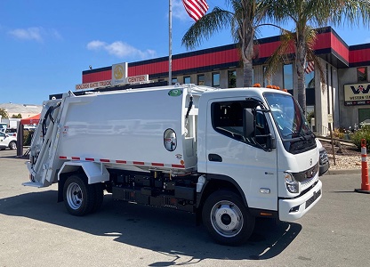 Rizon electric refuse truck at a Velocity Truck Centers location
